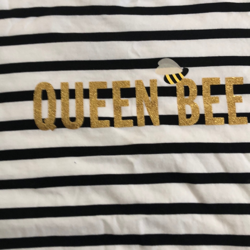 Kate Spade. Short sleeve shirt. Never worn. Size M